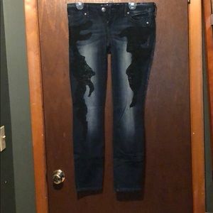 Express Rerock Skinny Jeans with lace accents